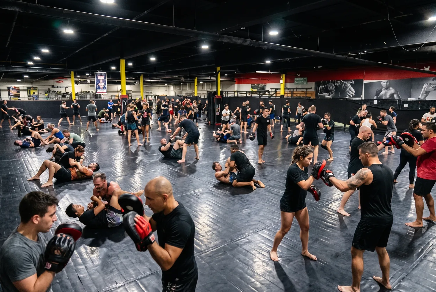A mixed adult class drilling both grappling and striking together at Xtreme Couture