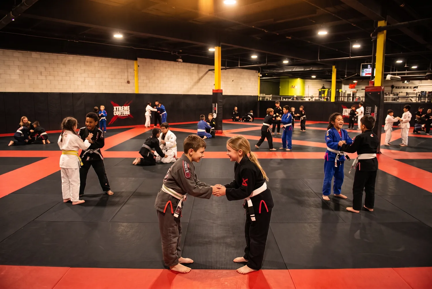 Young students training together and encouraging one another